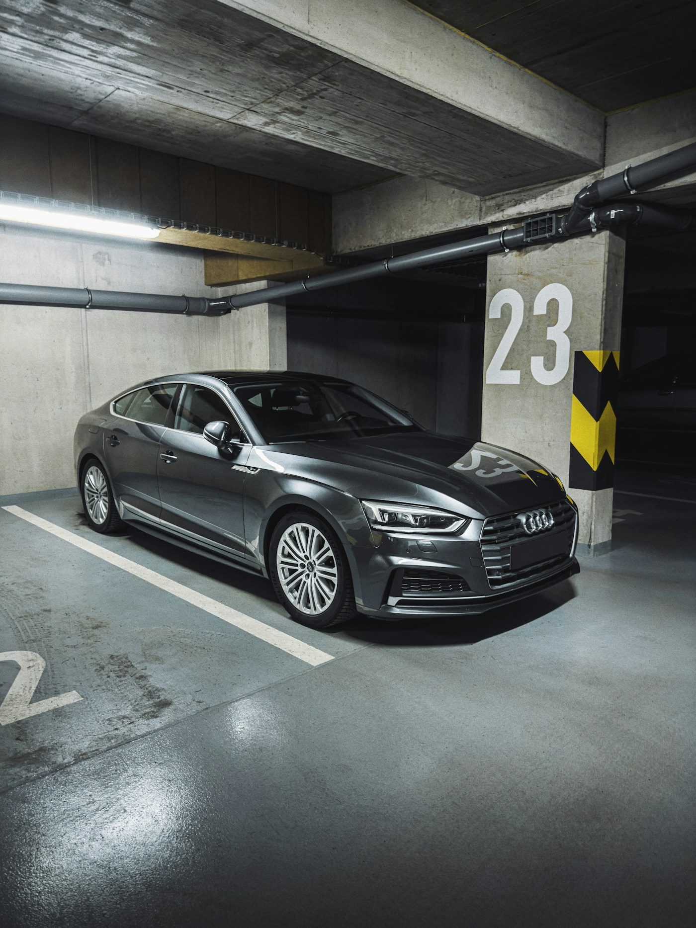 Passenger car parked indoors