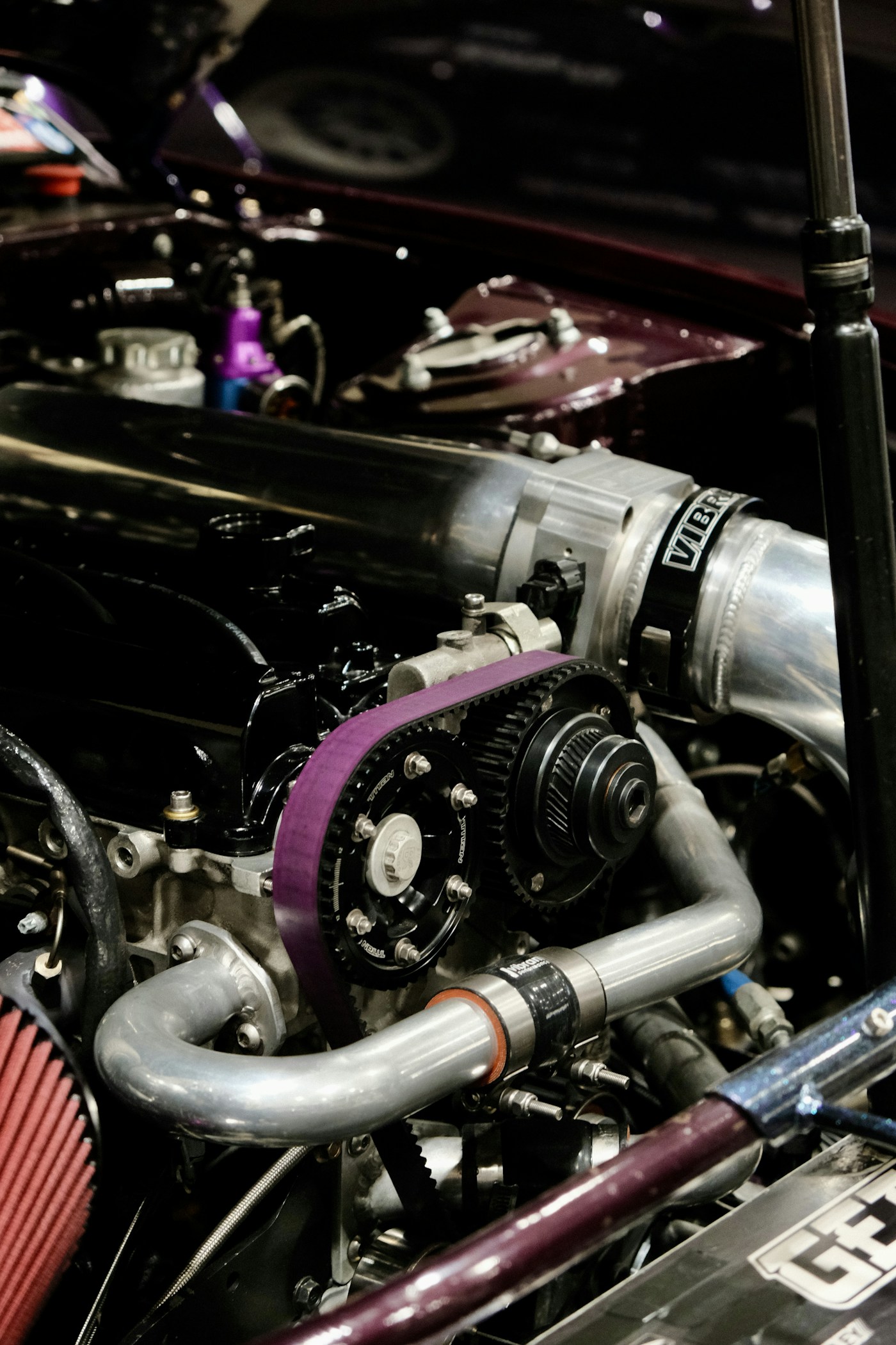 Engine bay with visible fuel and intake components